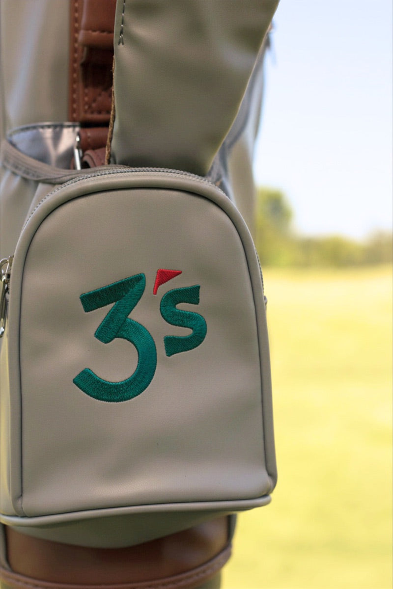 Custom club logo embroidered on a bag's ball pocket